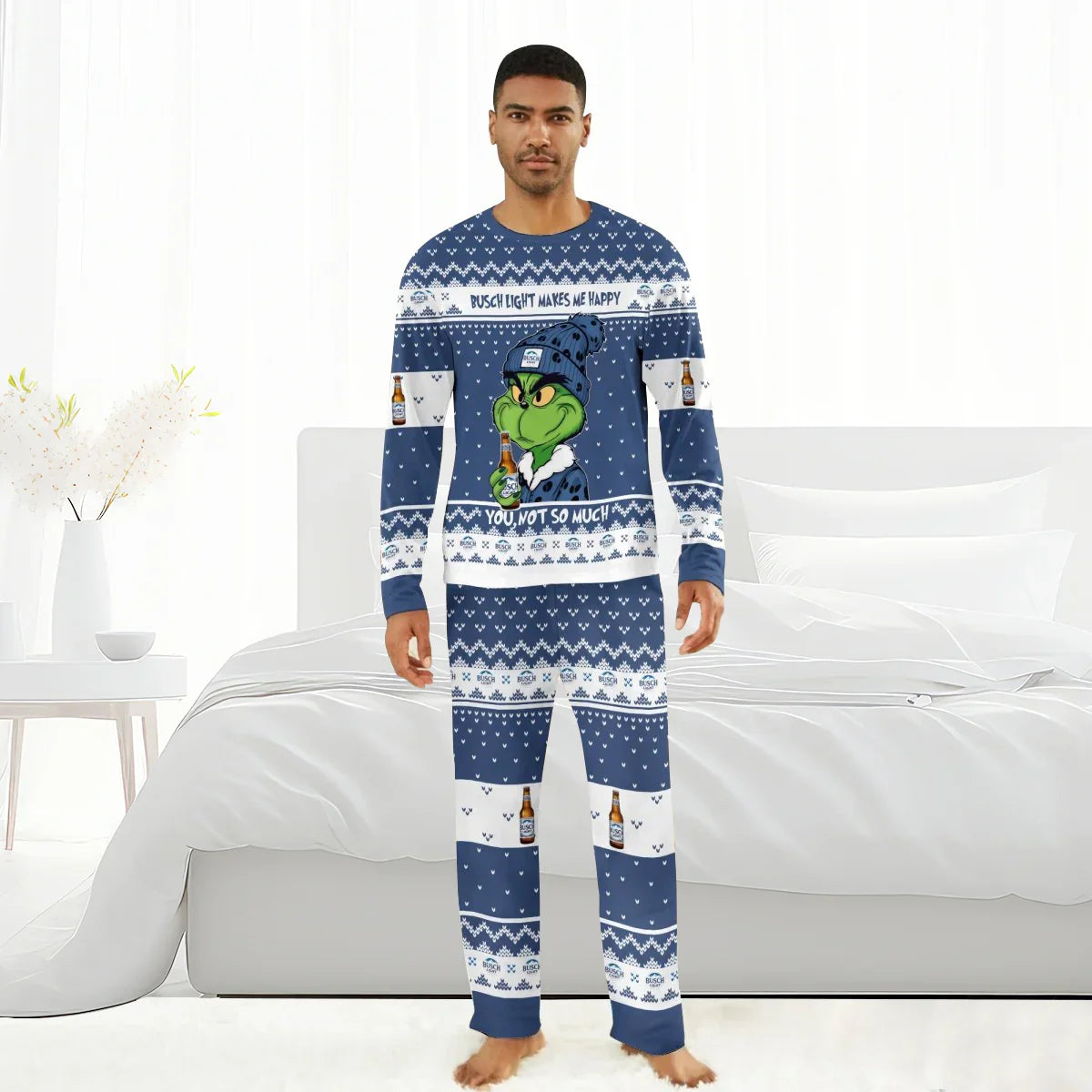 Man wearing blue and white Busch Light Grinch family pajamas with slogan and beer bottle graphics