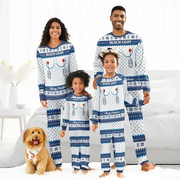 Smiling family in matching Busch Light Merry Christmas pajamas with reindeer antlers and dog in festive bandana