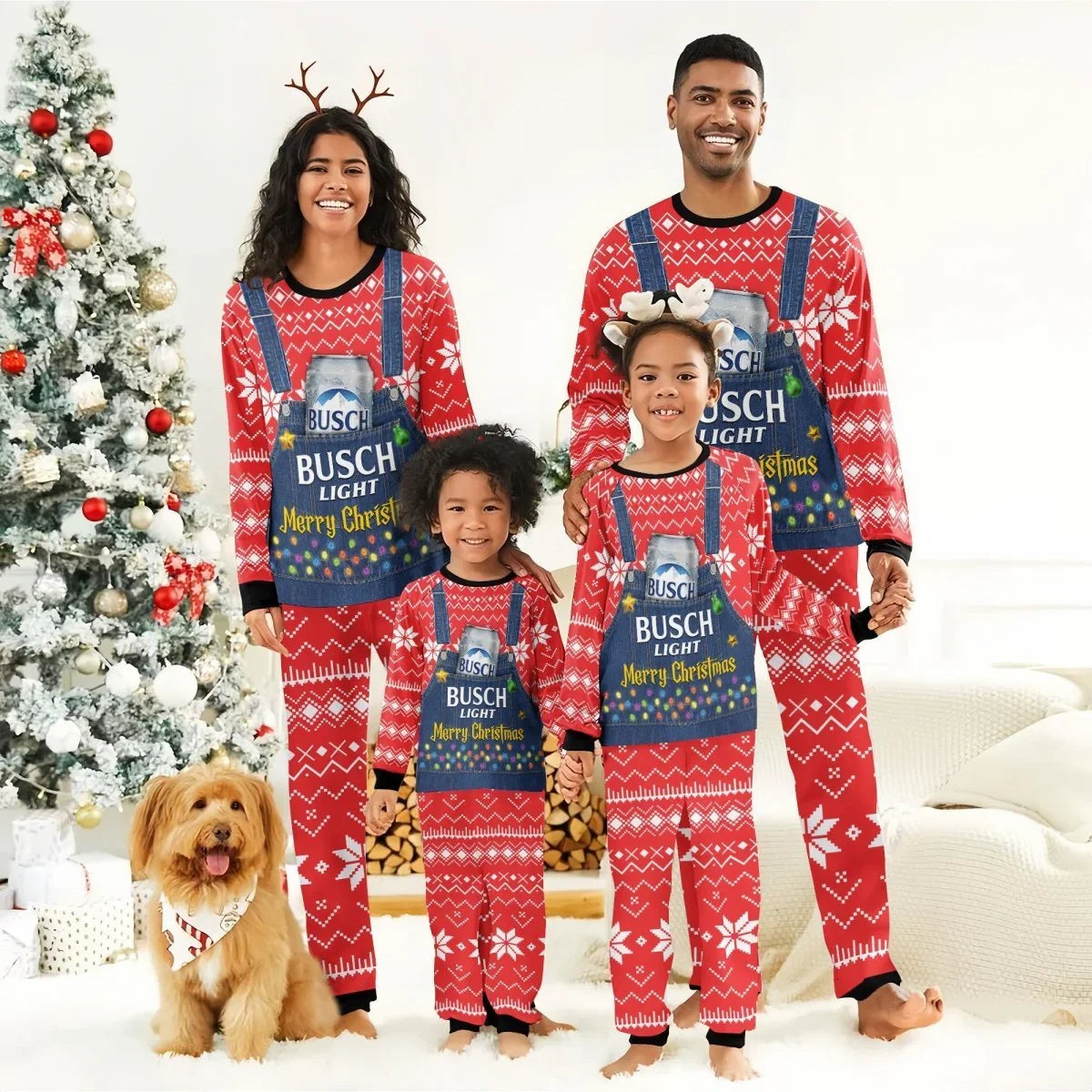 Smiling family in red Busch Light Merry Christmas pajamas with reindeer antlers by decorated Christmas tree