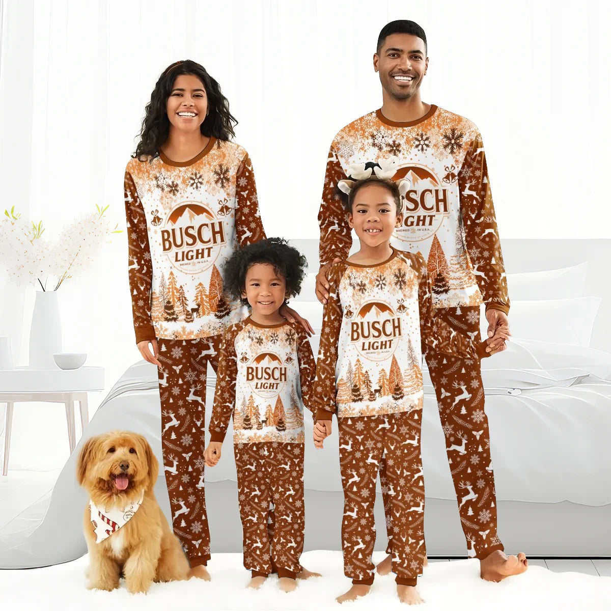 Family of four wearing matching brown and white Busch Light Christmas pajamas with snowflakes and reindeer print indoors