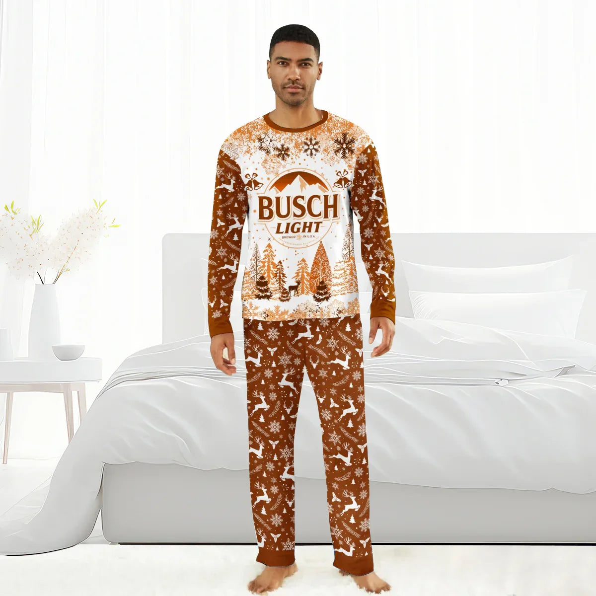 Man wearing brown and white Busch Light Christmas pajamas with reindeer and snowflake patterns