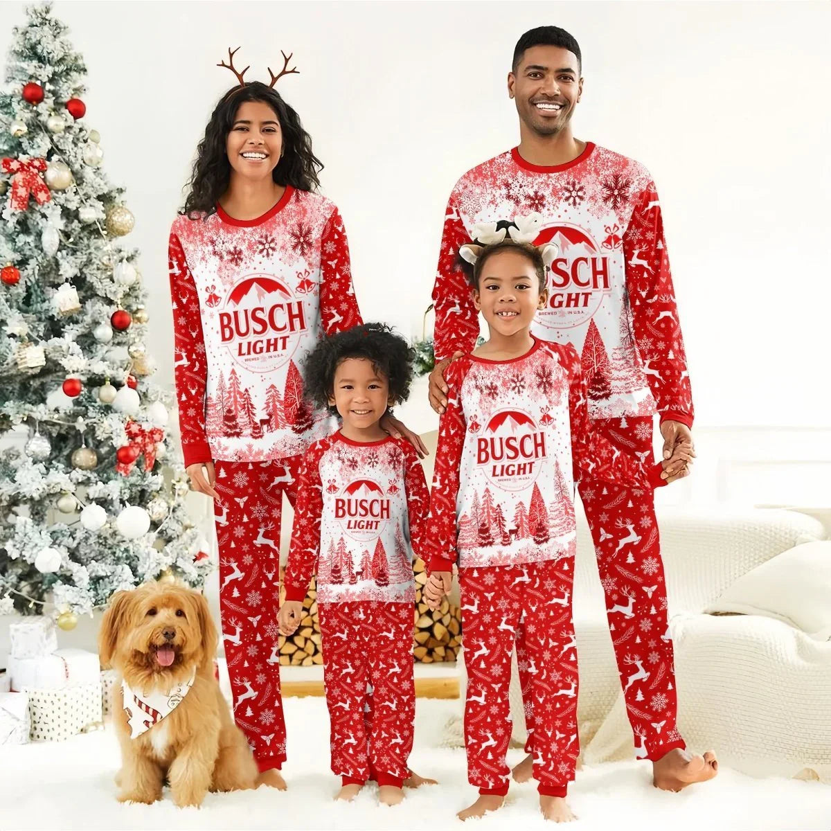 Happy family wearing matching red Busch Light Christmas pajamas by decorated tree with dog in festive bandana