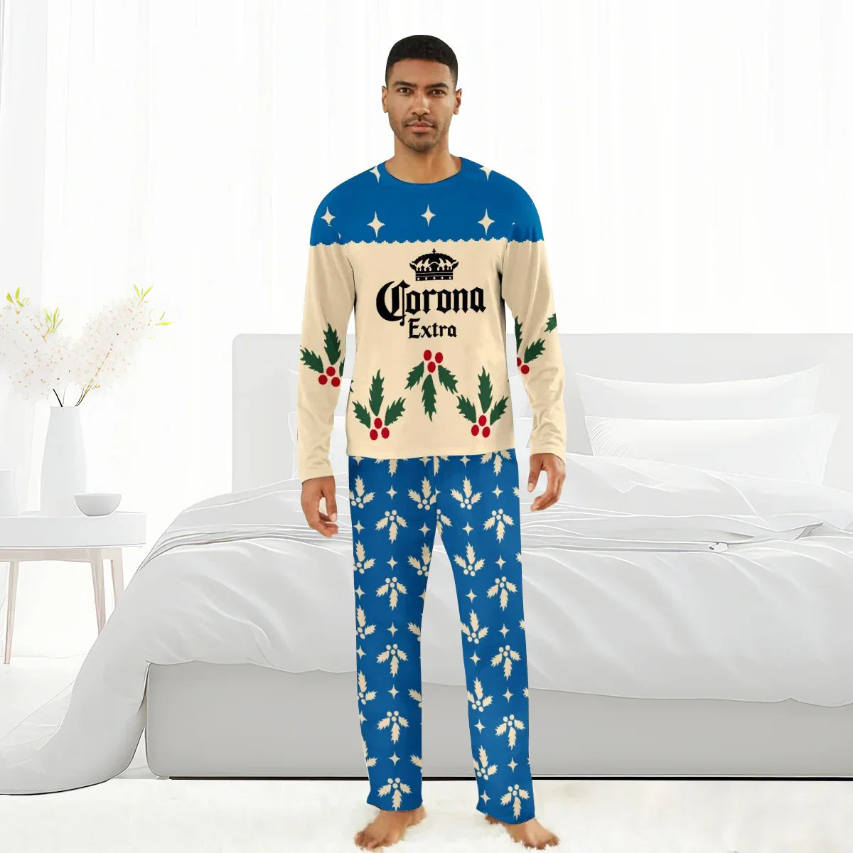 Man wearing Corona Extra Christmas pajamas with holly pattern in a bright bedroom