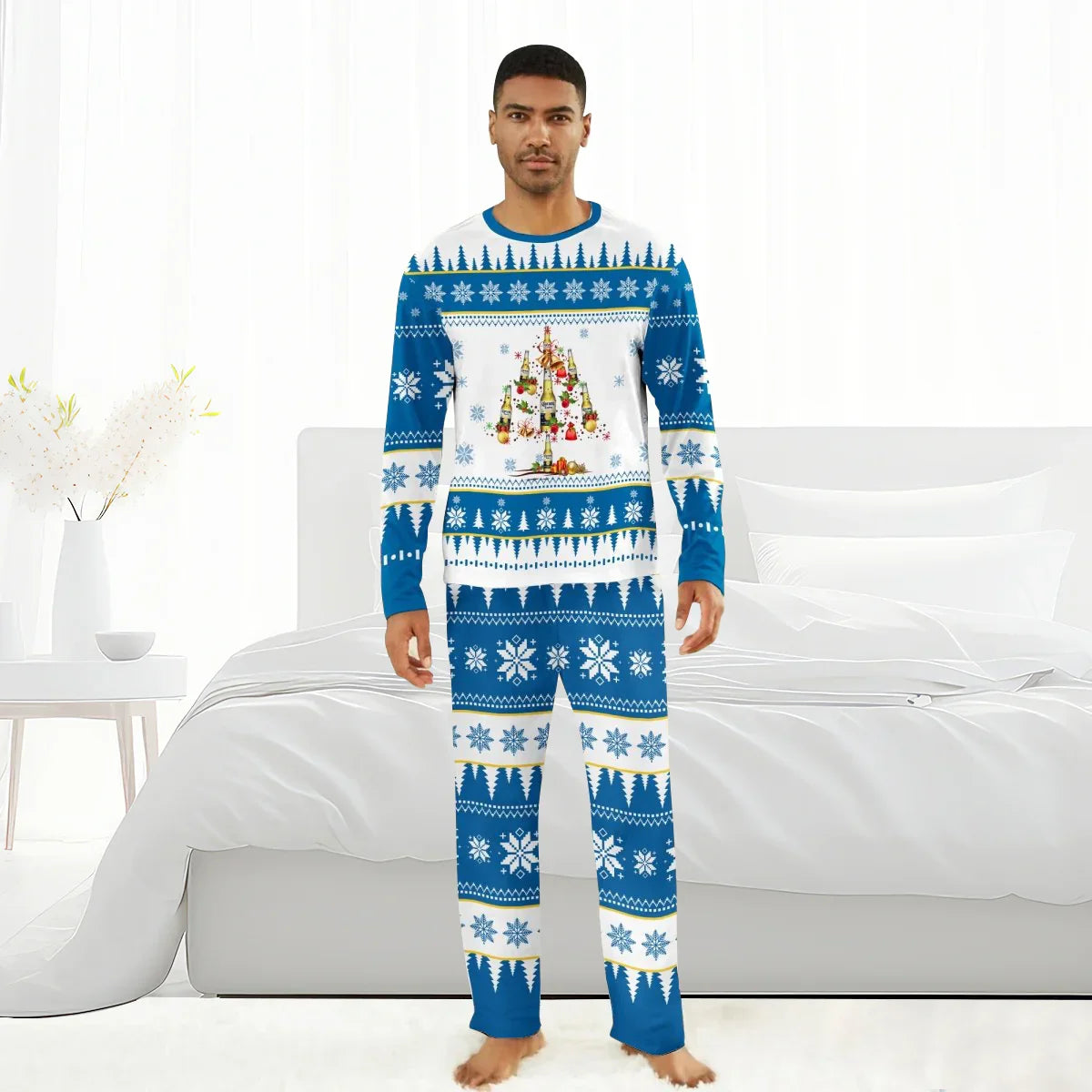 Man wearing blue and white Christmas pajamas with snowflakes and beer bottle tree design in modern bedroom