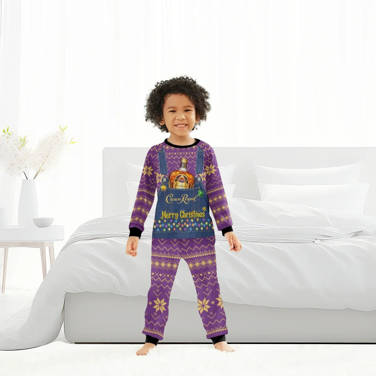 Smiling child in purple Crown Royal Merry Christmas holiday pajamas standing barefoot in bright bedroom