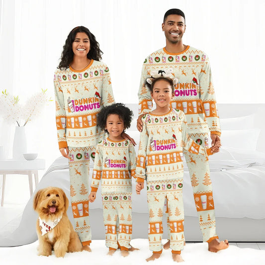 Smiling family in matching Dunkin Donuts Christmas pajamas with festive reindeer patterns, indoors