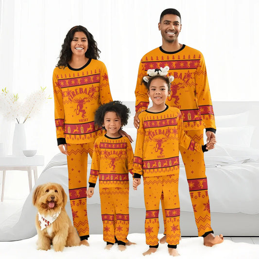 Family of four wearing matching orange Fireball Whisky Christmas pajamas with festive patterns, dog with holiday bandana