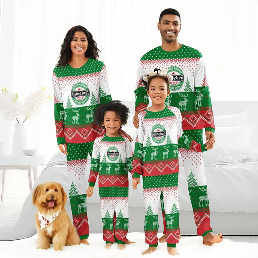 Family in matching Heineken Christmas pajamas with reindeer and Christmas tree patterns, indoor setting with dog