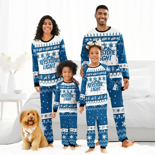 Family of four in matching Keystone Light blue and white Christmas pajamas with snowflakes and reindeer, dog with bandana