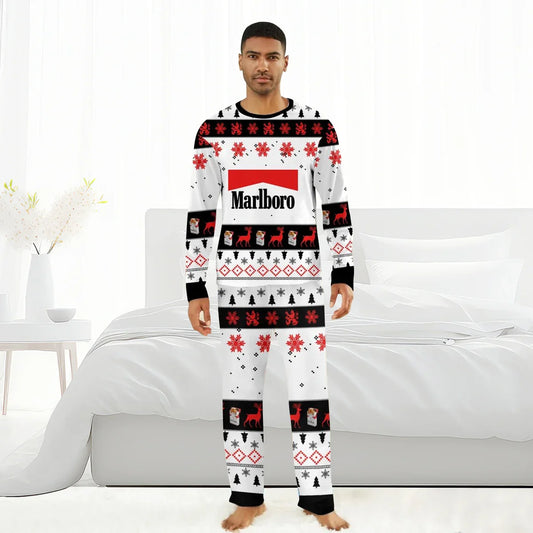 Man wearing Marlboro holiday pajamas with red snowflakes, reindeer, and black Christmas trees in white bedroom