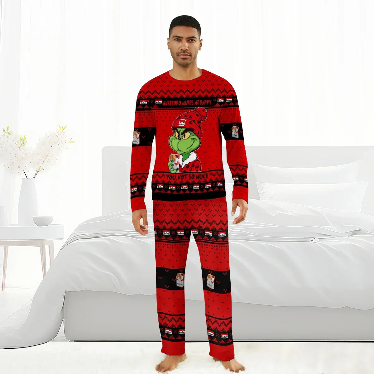 Man wearing red Marlboro Grinch Christmas pajamas set in a bright bedroom