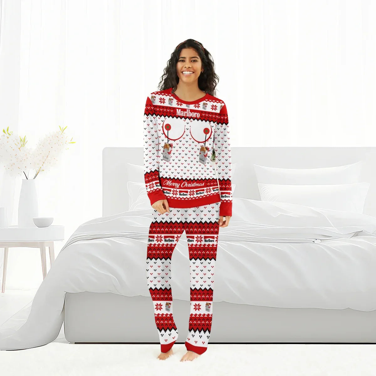 Smiling woman in red and white Marlboro Merry Christmas pajama set standing barefoot in bright modern bedroom