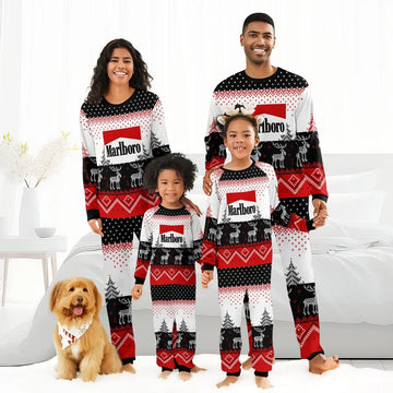 Family of four wearing matching red black white Marlboro reindeer Christmas pajamas with dog