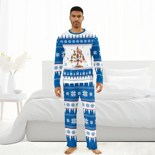 Man wearing blue and white Christmas pajamas with snowflakes and holiday tree design in modern bedroom