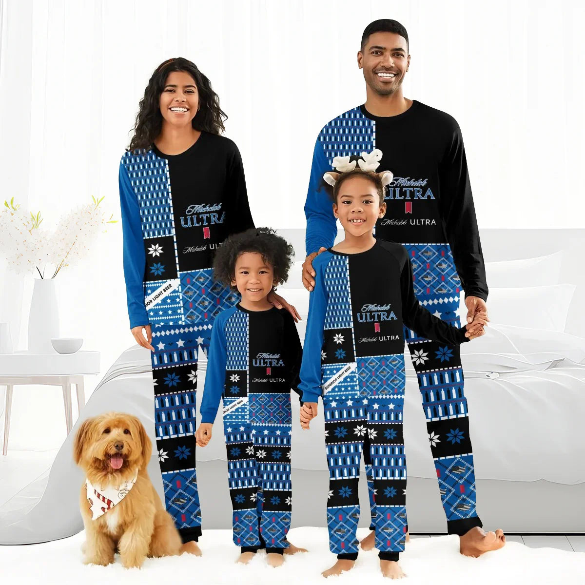 Smiling family of four wearing matching blue Michelob Ultra holiday pajamas with patterns, standing barefoot in bedroom with dog