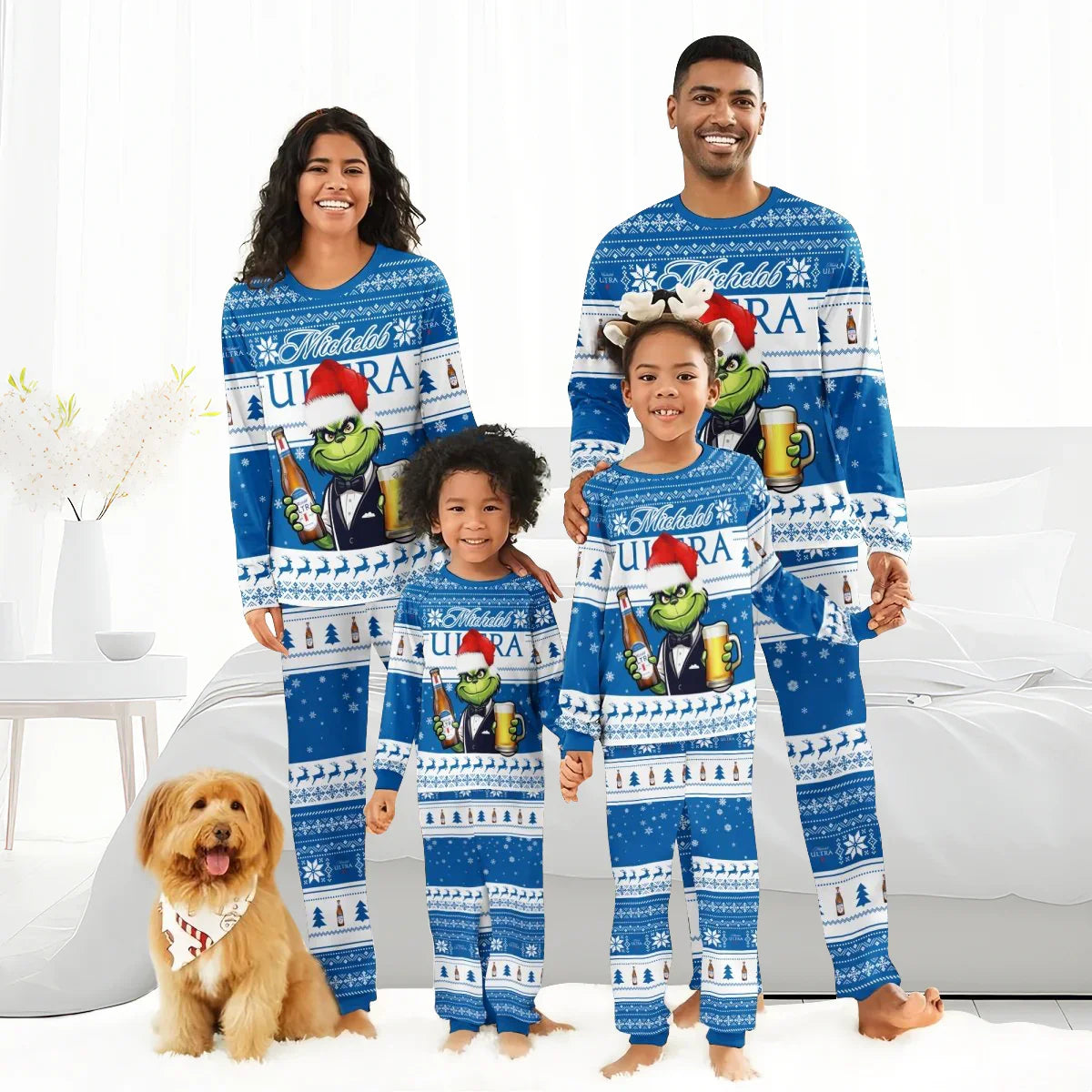 Happy family of four and dog wearing matching blue Michelob Ultra Grinch Christmas pajamas in bright bedroom