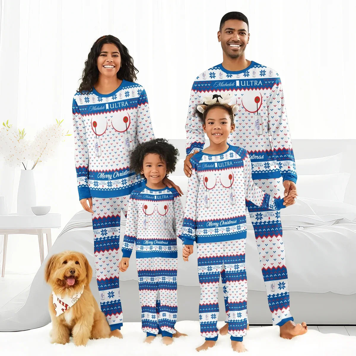 Smiling family in matching Michelob Ultra Christmas pajamas with dog in festive bandana in bright bedroom