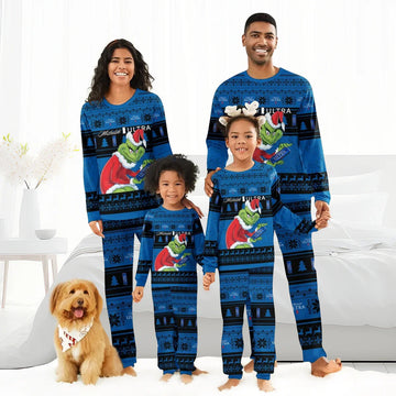 Family wearing matching blue Michelob Ultra Grinch Christmas pajamas with a dog in a festive bandana