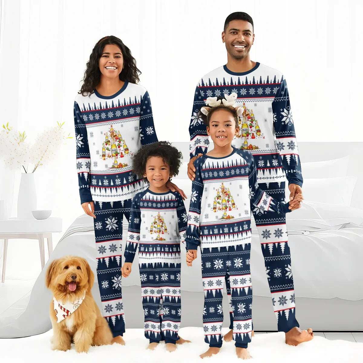 Smiling family in matching Modelo Christmas tree patterned pajamas with dog wearing holiday bandana