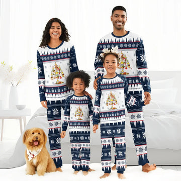 Smiling family in matching Modelo Christmas tree patterned pajamas with dog wearing holiday bandana