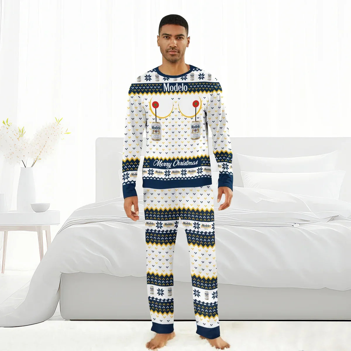 Man wearing Modelo Christmas-themed pajama set with beer can and festive patterns in bright bedroom