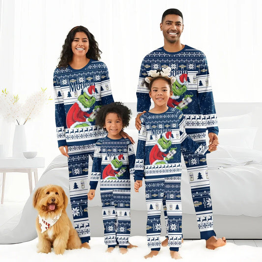 Smiling family wearing matching blue Modelo Santa Grinch holiday pajamas with Christmas patterns and dog with festive bandana
