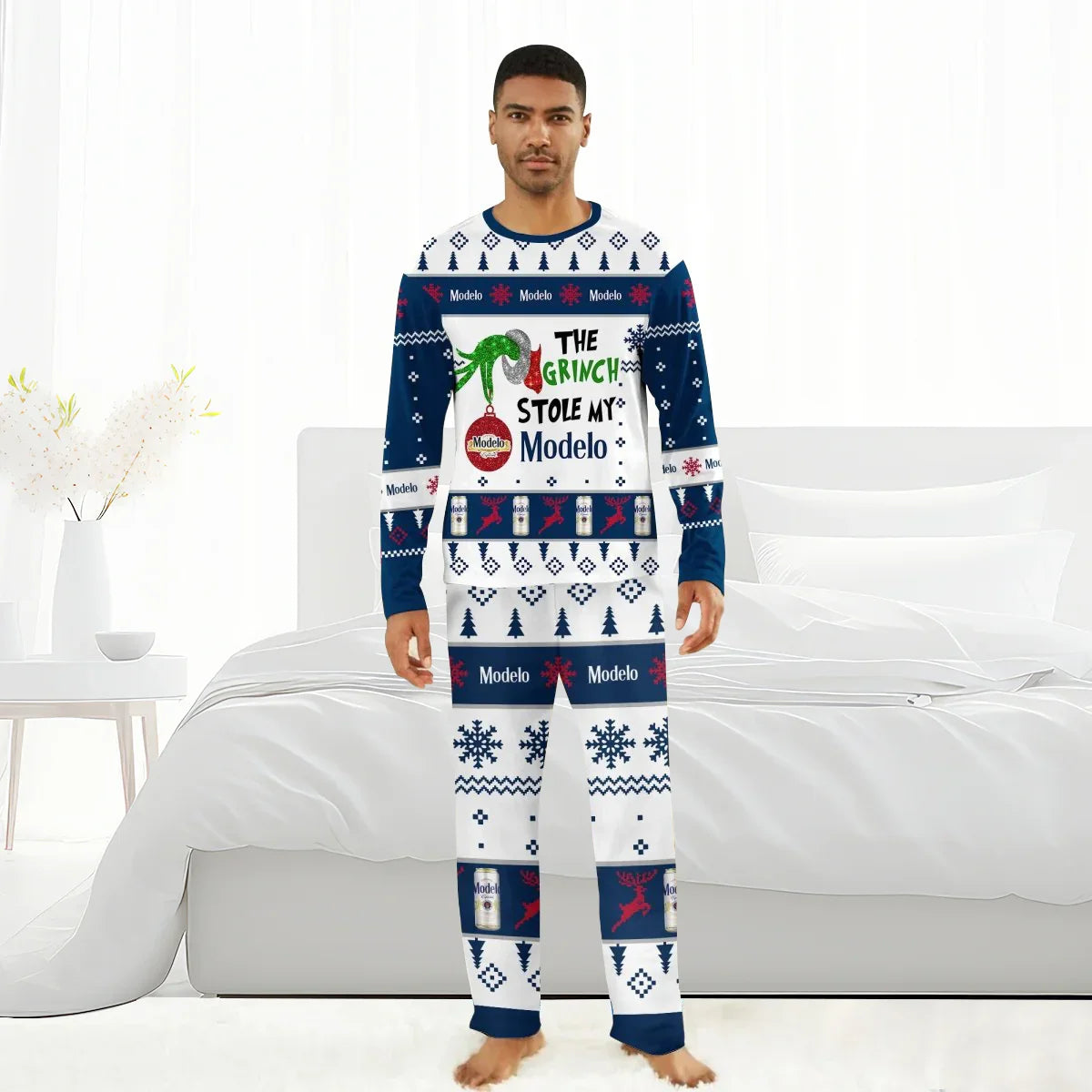 Man wearing Christmas pajama set with The Grinch and Modelo beer themed holiday design