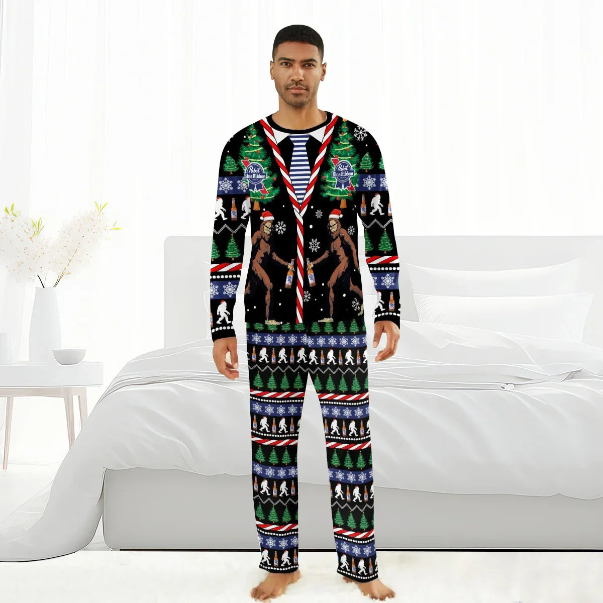 Man wearing Pabst Blue Ribbon Christmas Bigfoot family pajamas with holiday trees and snowflakes