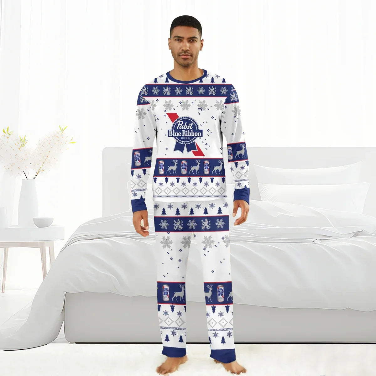Man in Pabst Blue Ribbon Christmas-themed pajama set with beer cans, reindeer, and snowflake patterns