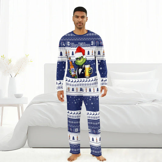 Man wearing blue and white Pabst Blue Ribbon holiday pajamas with Grinch holding beer bottle and glass