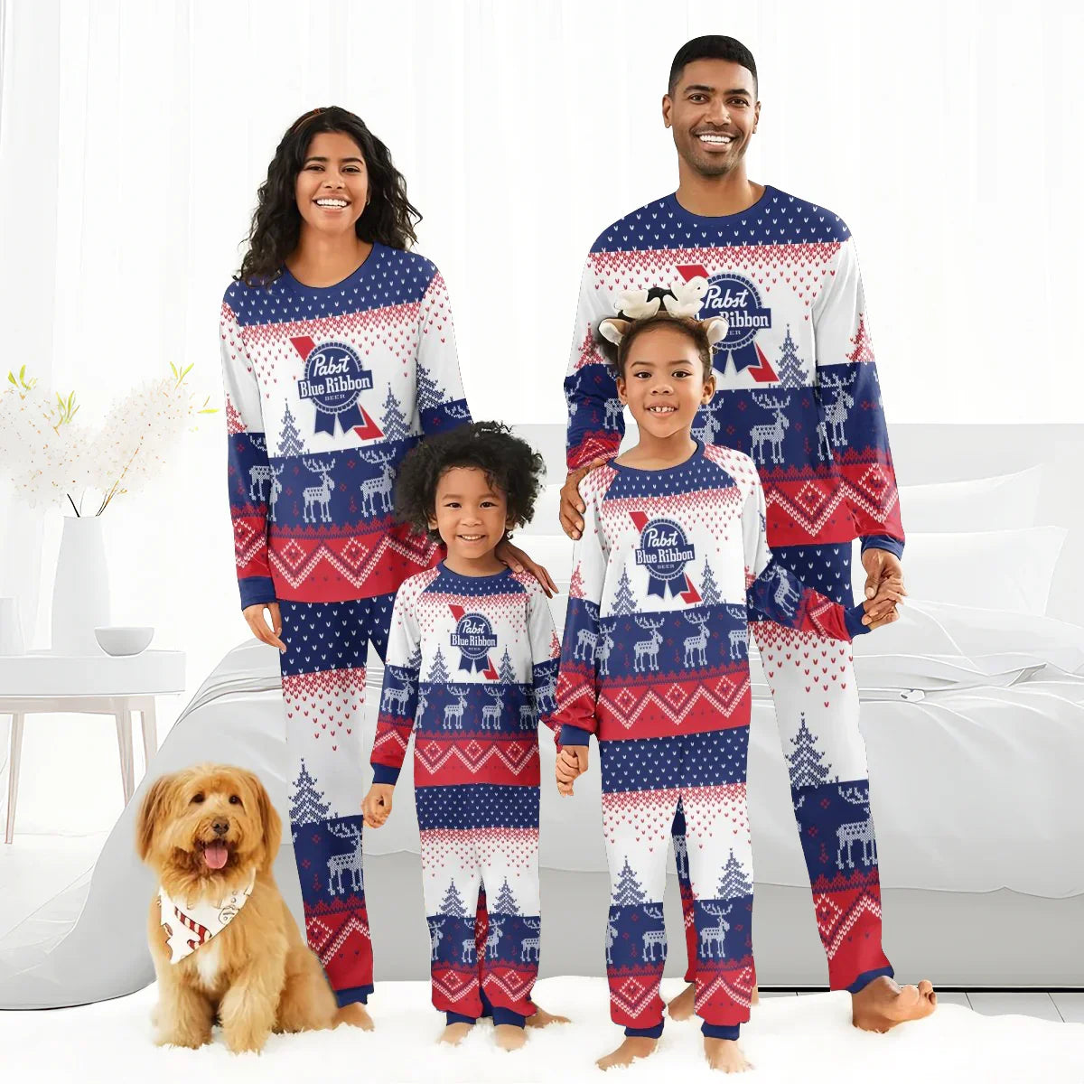 Family of four in matching Pabst Blue Ribbon holiday pajamas with reindeer patterns and a dog wearing a festive bandana