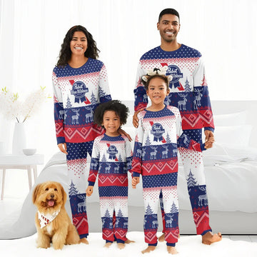 Family of four in matching Pabst Blue Ribbon holiday pajamas with reindeer patterns and a dog wearing a festive bandana
