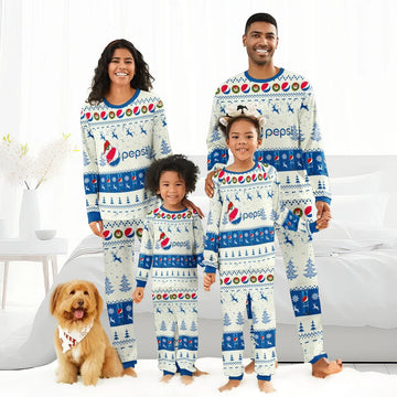 Family in matching Pepsi-themed Christmas reindeer pajamas with holiday patterns, smiling in bedroom