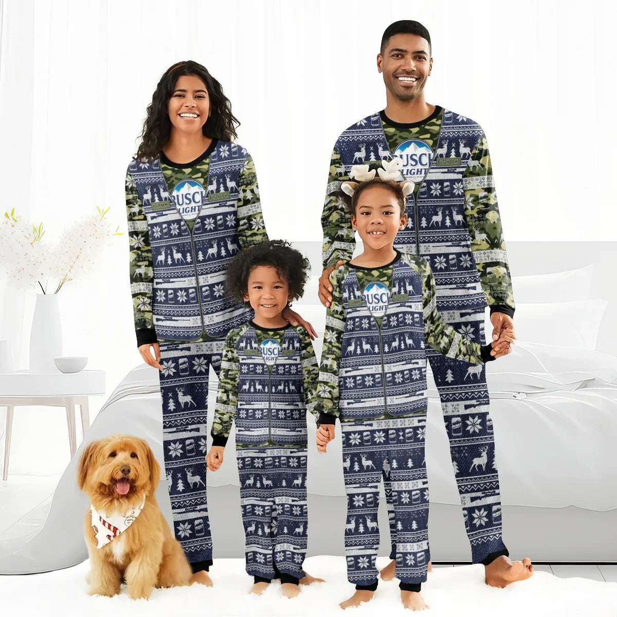 Smiling family in matching blue and camo Busch Light Christmas pajamas with reindeer patterns and a dog wearing a holiday bandana