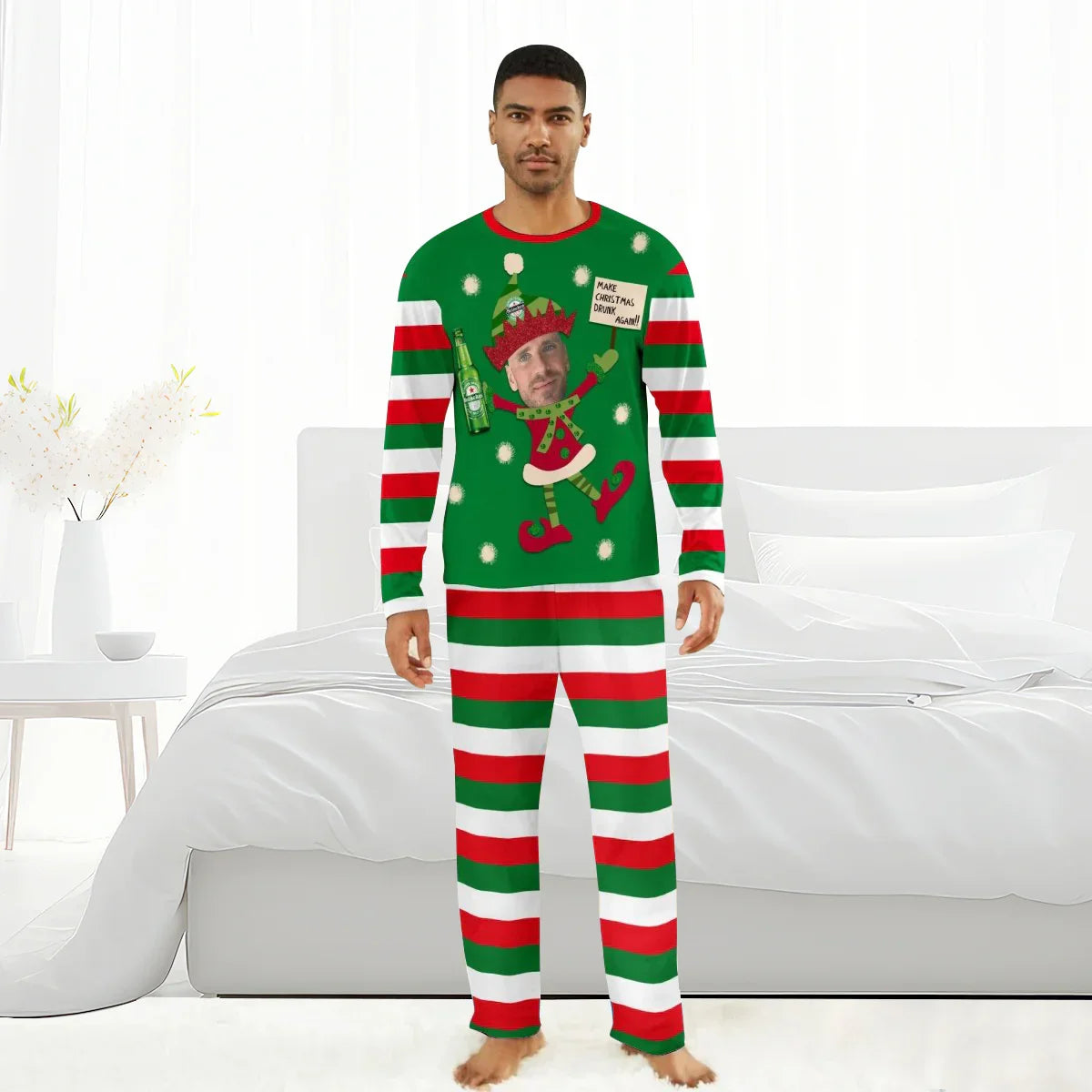 Man wearing personalized Christmas pajamas with elf holding beer and 'Make Christmas Drink Again' sign