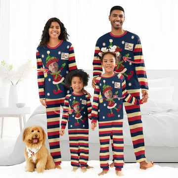 Family in matching striped Christmas pajamas with personalized elf face and festive print, dog with holiday bandana