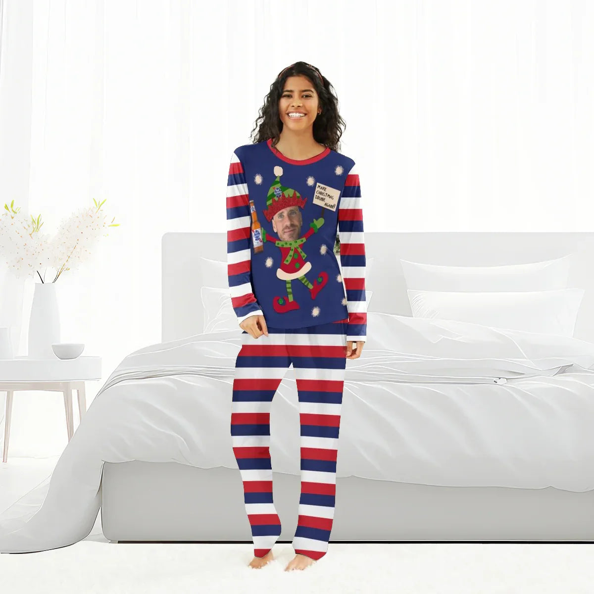 Woman wearing personalized Pabst Blue Ribbon Christmas pajamas with striped pants in bright bedroom