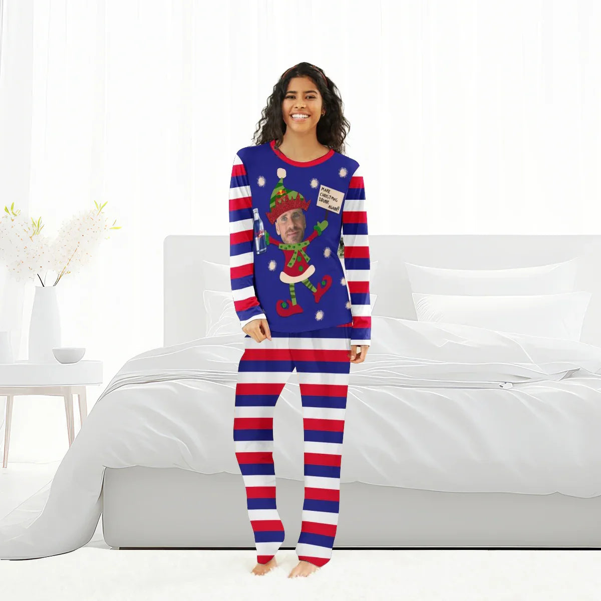 Woman in red, white, and blue striped Christmas pajamas with elf graphic and custom face