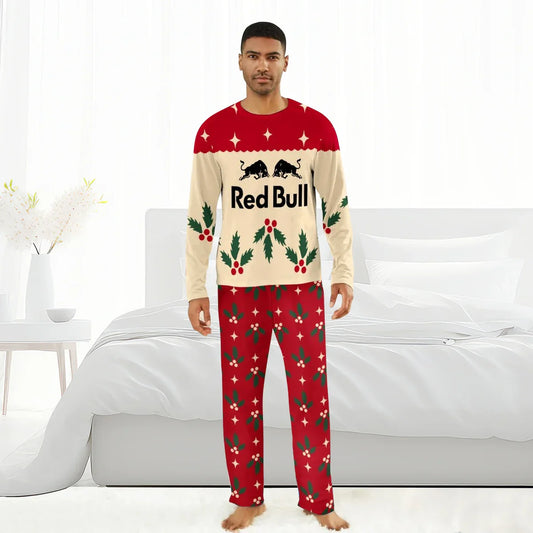 Man wearing Red Bull Christmas cherry holiday pajamas in bright bedroom with white bed and decor