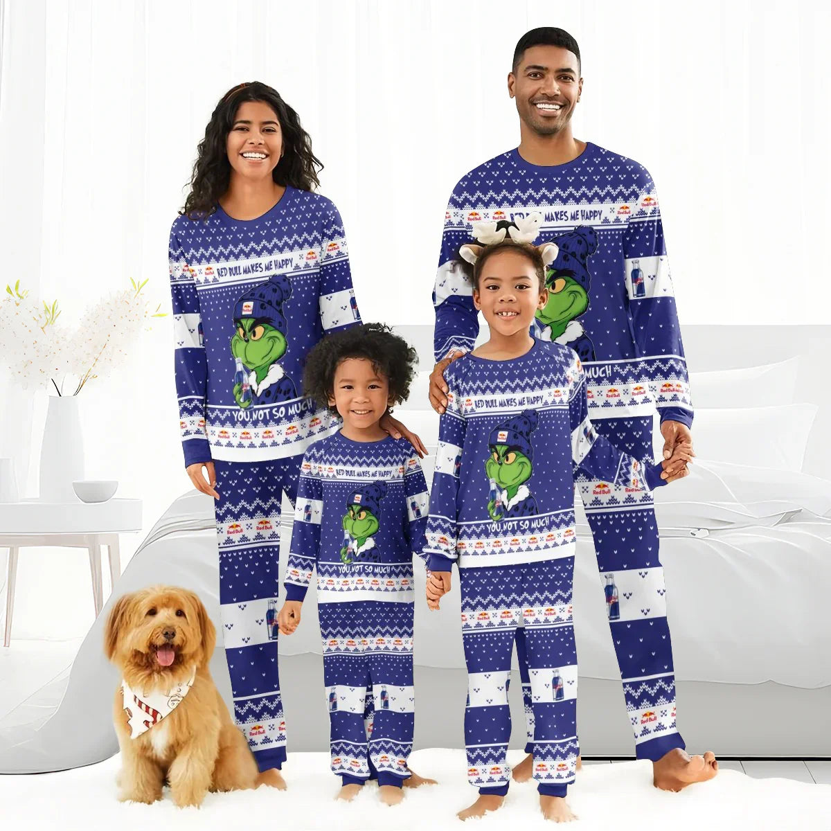 Happy family in matching blue Red Bull Grinch holiday pajamas with dog in festive bandana