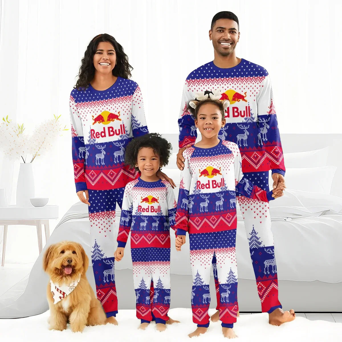 Family of four in matching Red Bull reindeer winter pajamas with red, white, and blue patterns and a fluffy dog