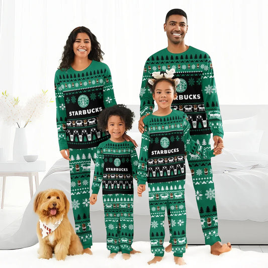 Smiling family of four wearing matching green Starbucks Christmas pajamas with holiday patterns in bright bedroom