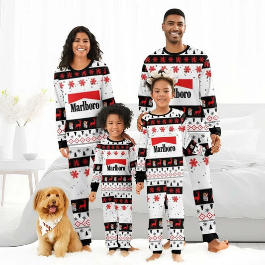 Smiling family in matching red, white, black Marlboro Christmas holiday pajamas with reindeer and snowflake patterns